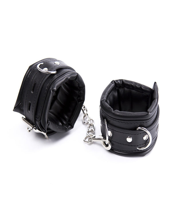 LEATHER WRIST CUFFS.