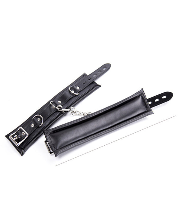 LEATHER WRIST CUFFS.